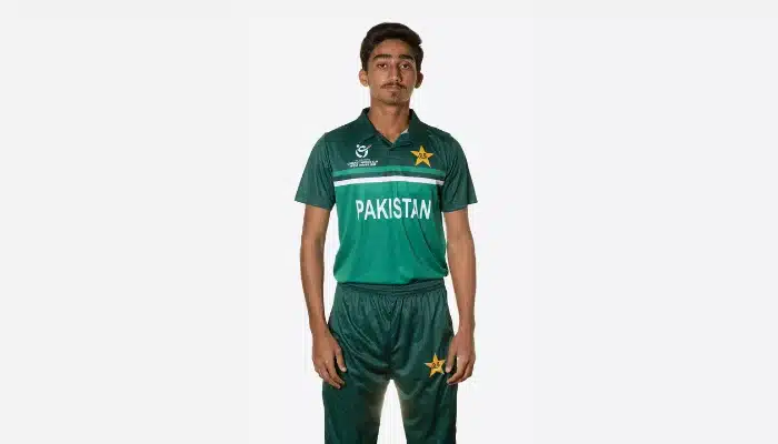 Faisal Akram Pakistani cricketer standing straight posing for picture