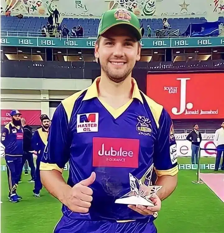 Rilee Rossouw PSL cricket player from Quetta gladiator standing in the ground after match holding reward for man of the match