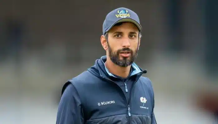 Shan Masood Pakistani cricketer standing straight posing for picture